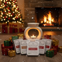 Wax melts with packaging in front of a Christmas tree and fireplace