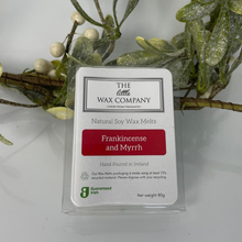 Pack of The Little Wax Company Frankincense and Myrrh wax melts with a decorative plant in the background.