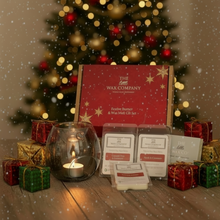 Wax product set from The Wax Company with Christmas tree and decorations in the background